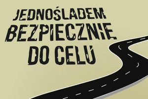 napis &quot;jednośladem bezpiecznie do celu&quot; i grafika drogi